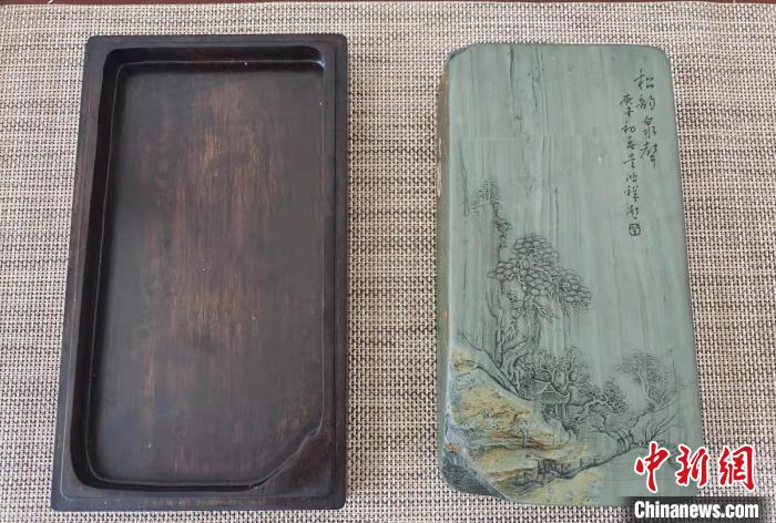 圖為盧保勝為提升洮硯文化內(nèi)涵，制作“一硯一銘、一盒一拓”成品展示。　張婧 攝